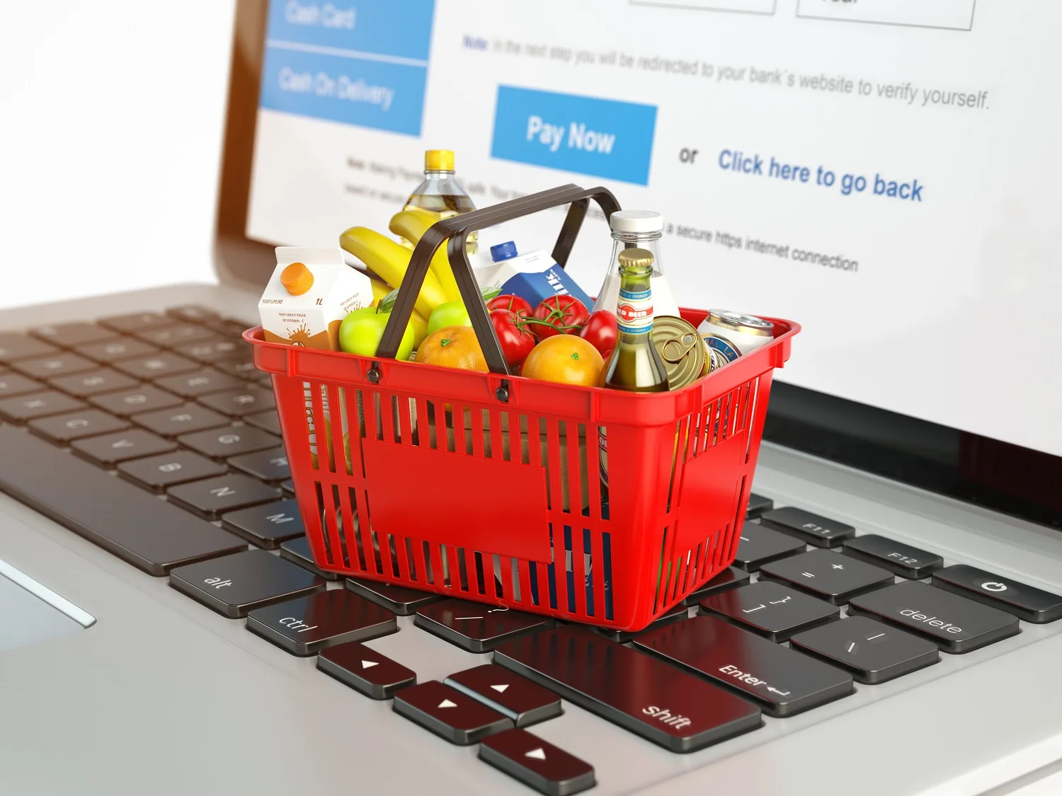Shopping basket with variety of grocery products ion laptop keyboard. E-commerce concept 3d illustration