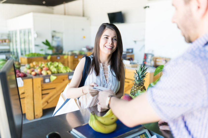 women at cash register