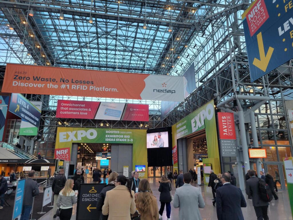 people attending trade show NRF 2023