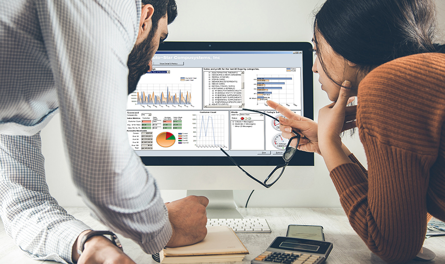 team working in graph on computer screen