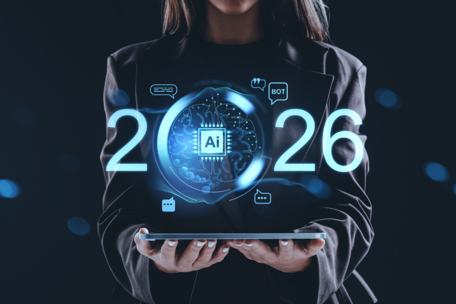 A business professional holds a digital tablet displaying a glowing AI interface with the numbers 2026, symbolizing the rapid evolution of technology trends and artificial intelligence.